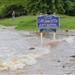 Flood at the Welcome to Manville Sign
